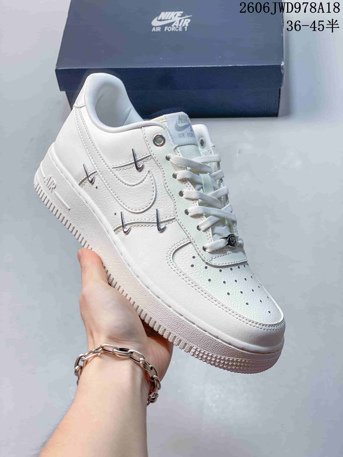Nike Air Force 1 Low White Sneakers with Metallic Accents