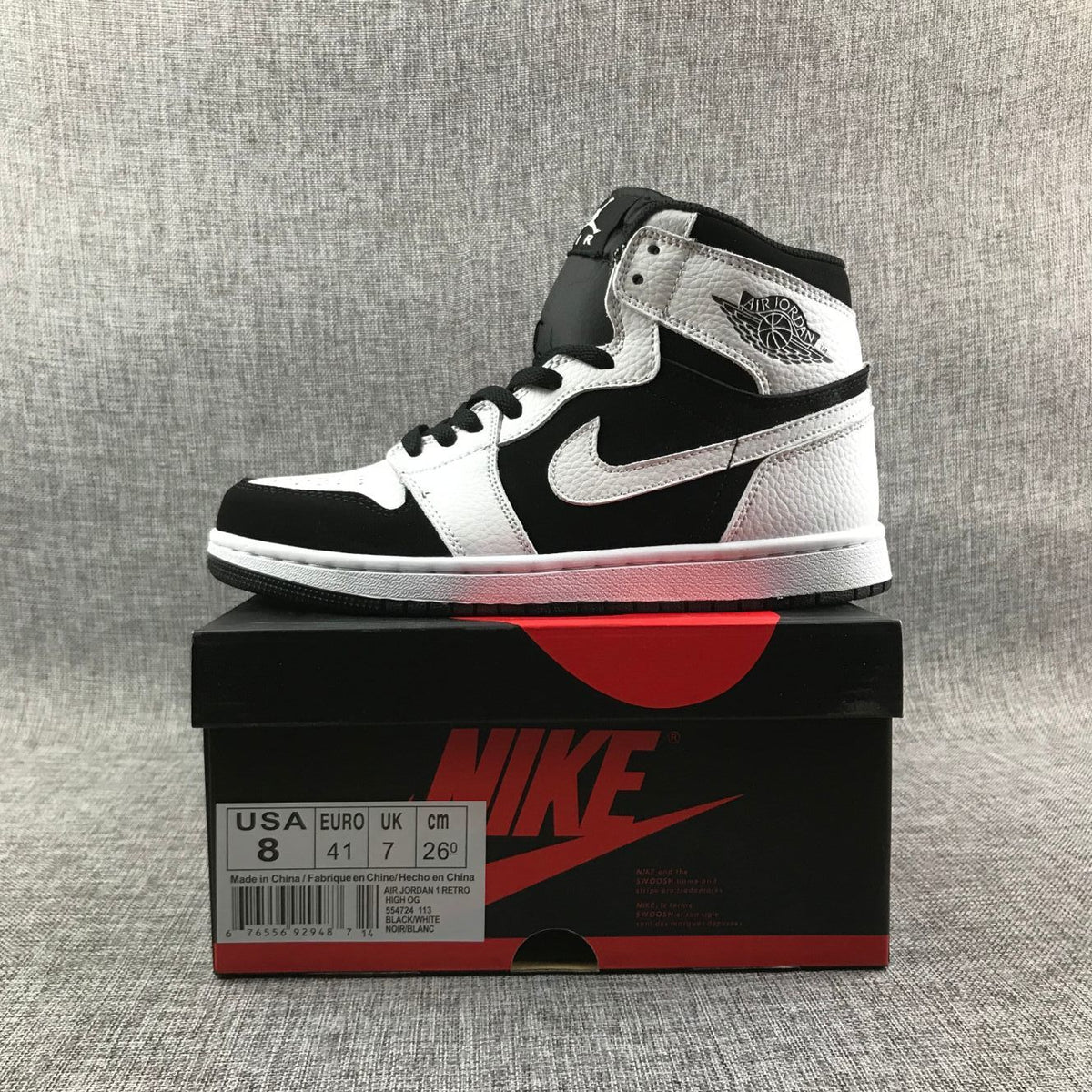 Sneaker displayed on its box; label shows US 8, EU 41, UK 7 and 26 cm
