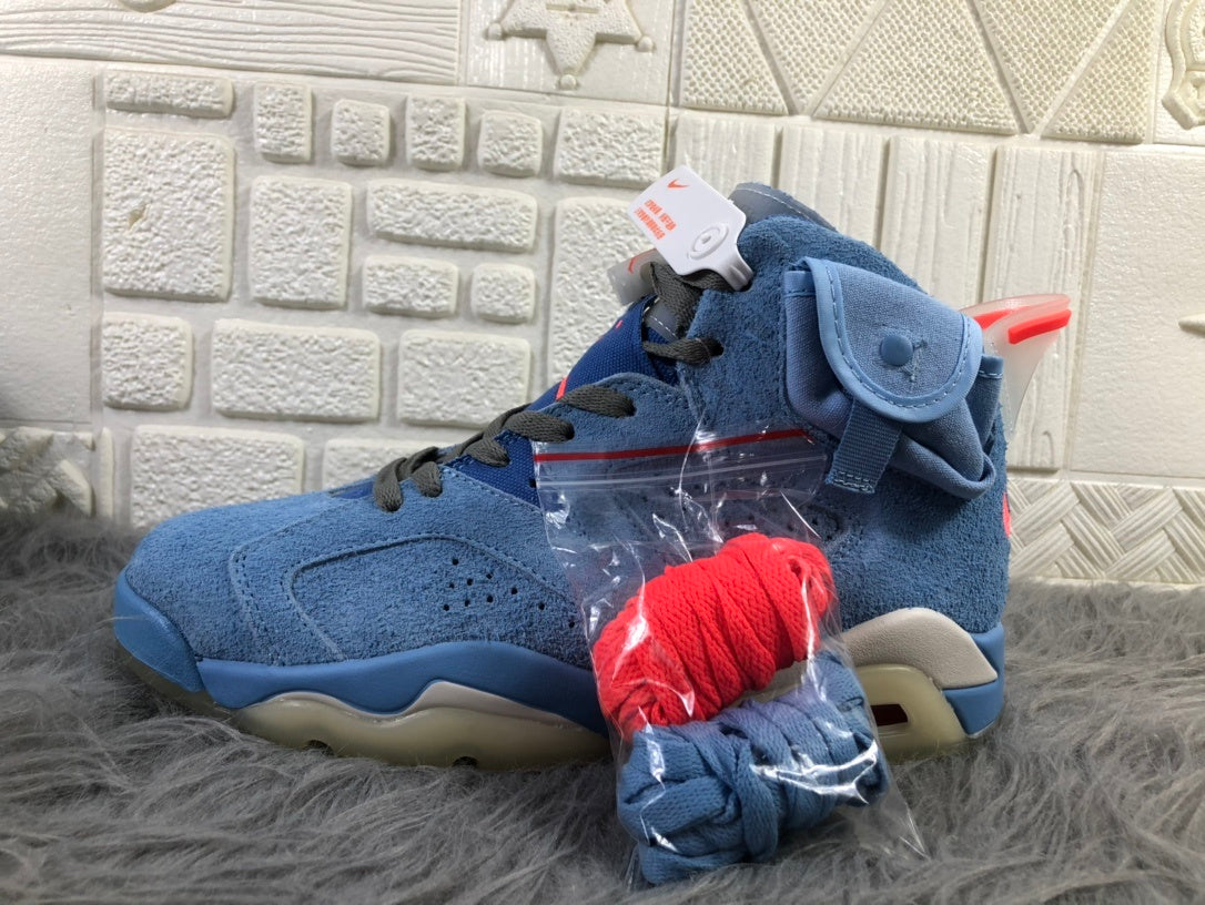Side view of the sneaker with extra blue and red laces displayed in a clear bag.