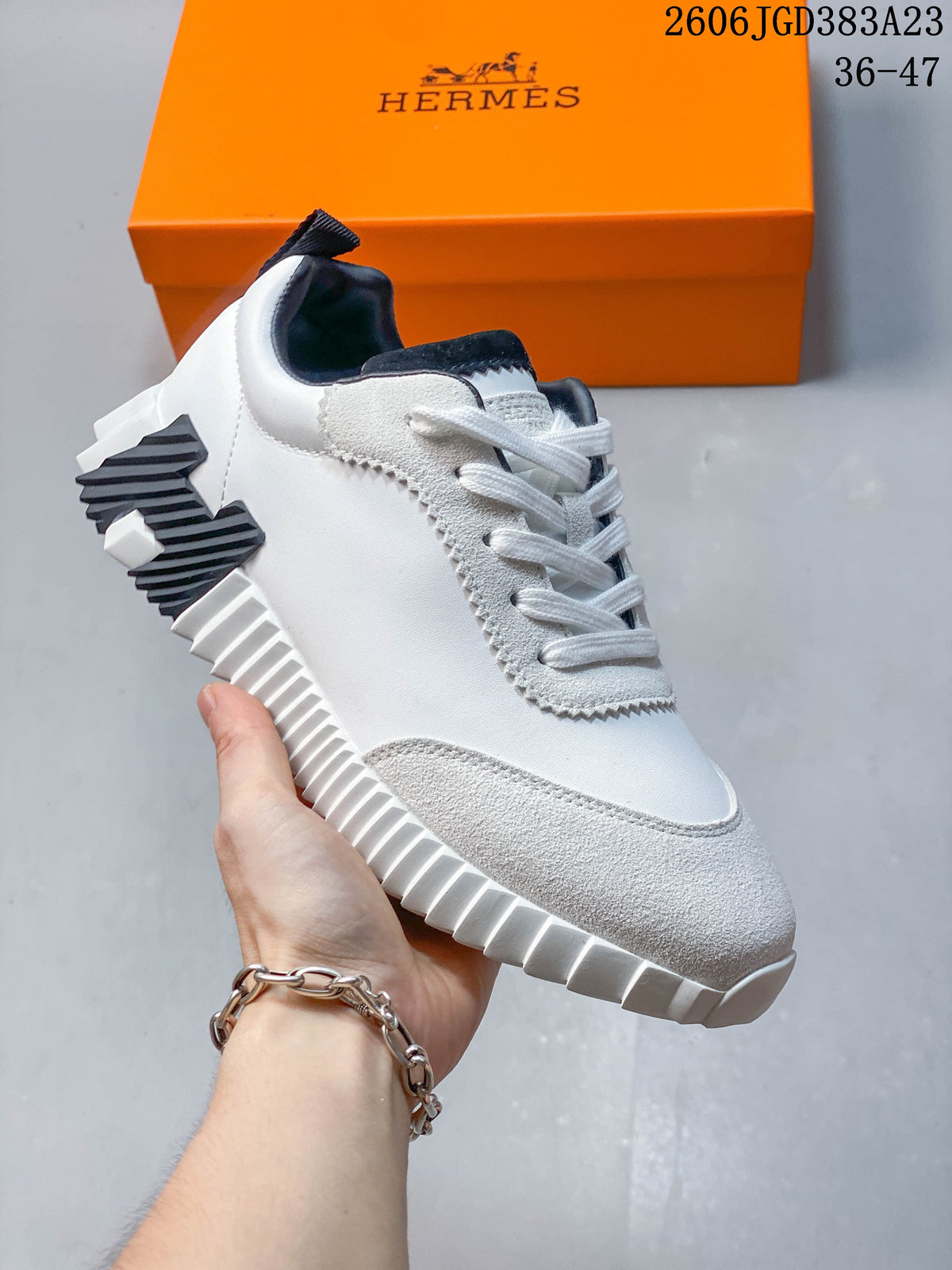 Hermès Low-Top Sneakers in White and Black