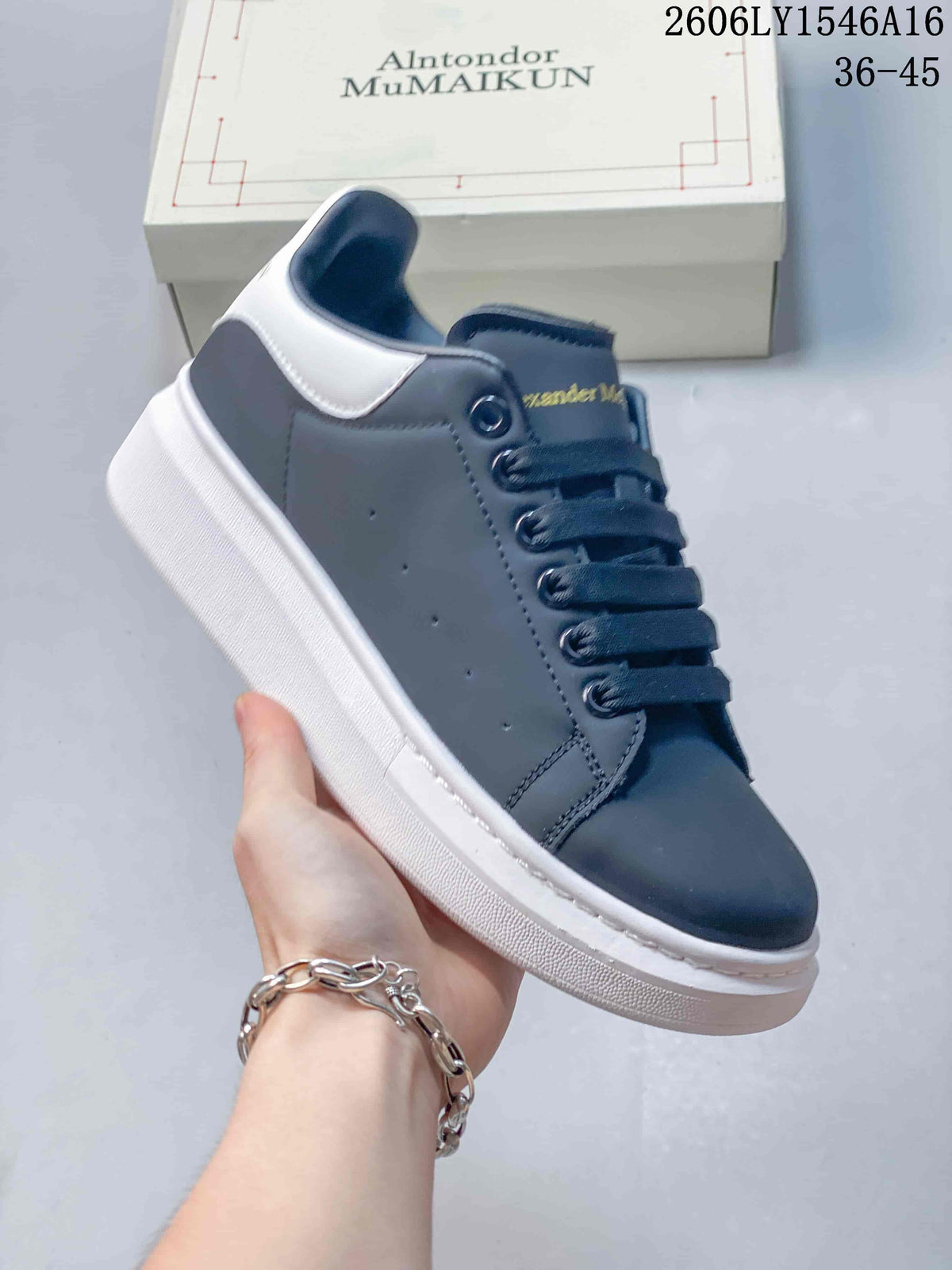 Alexander McQueen Low-Top Sneakers in Navy and White