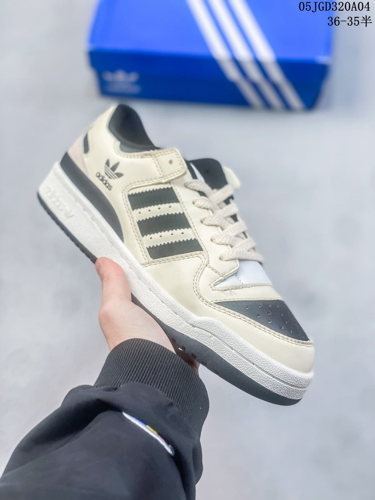 Adidas Originals Forum 84 Low Sneakers in Cream and Black