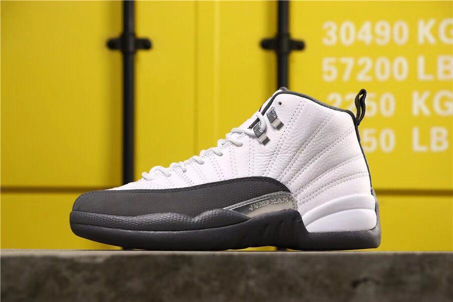 Opposite side profile showing the white upper, dark grey side panel and contrasting outsole.