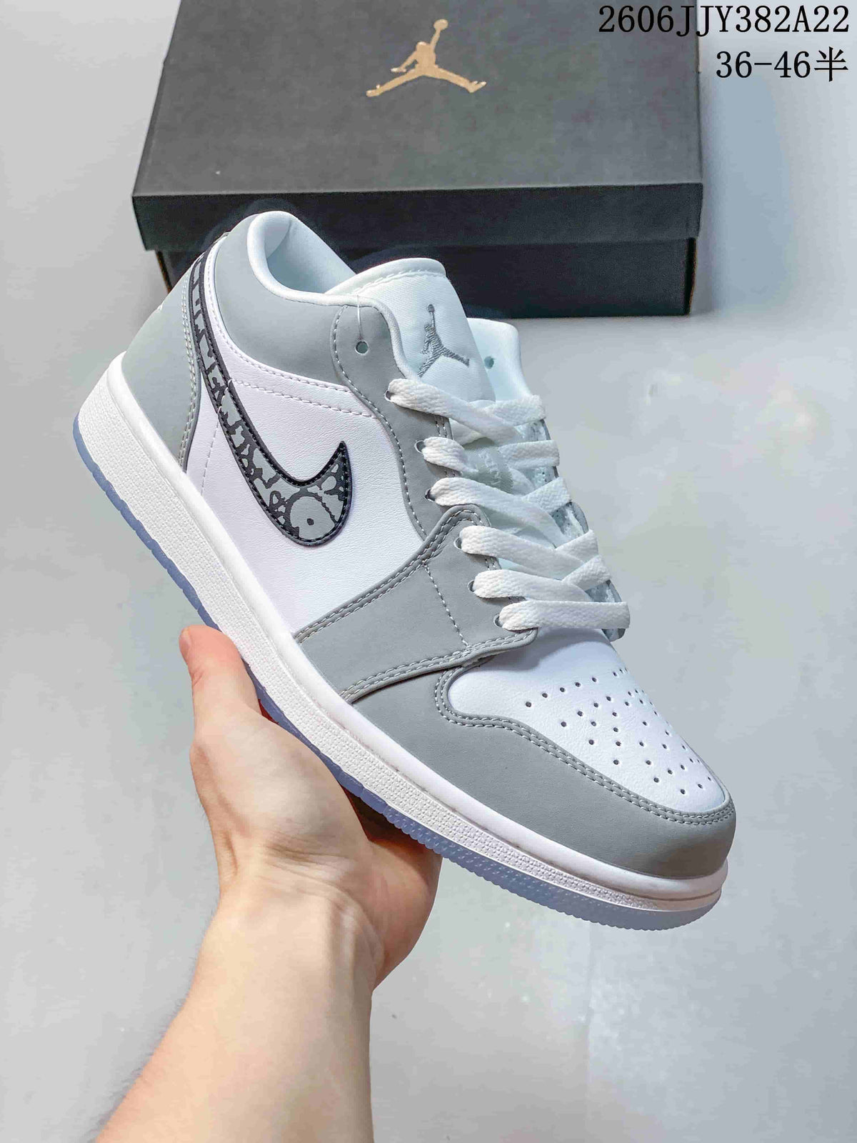 Air Jordan 1 Low White Grey Patterned Swoosh Sneakers