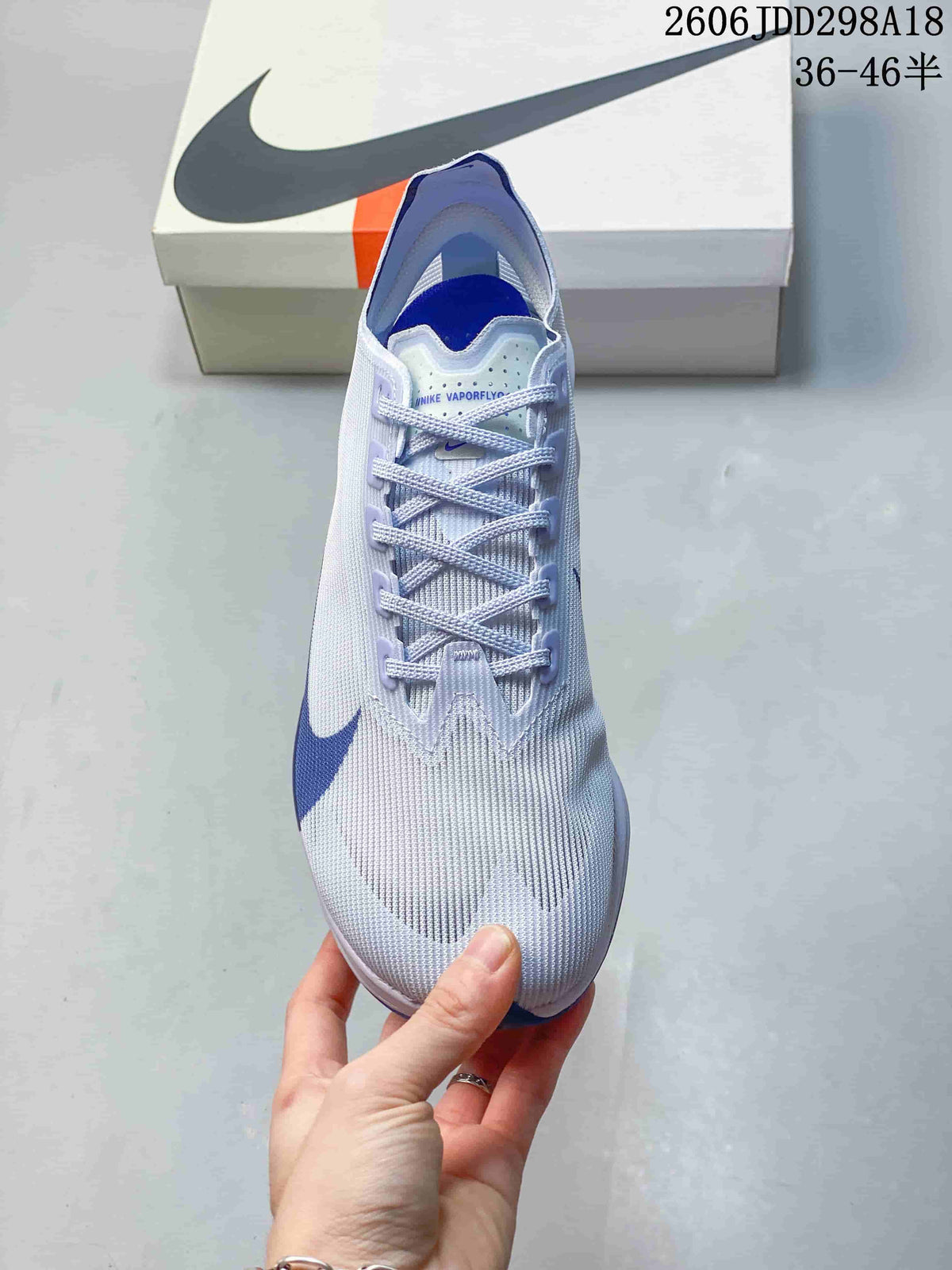 Nike ZoomX Vaporfly NEXT% 4 Road Racing Shoes, White and Blue