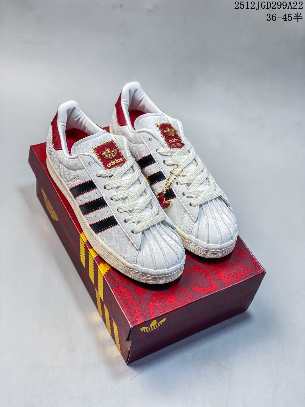 Adidas Superstar White and Red Low-Top Sneakers