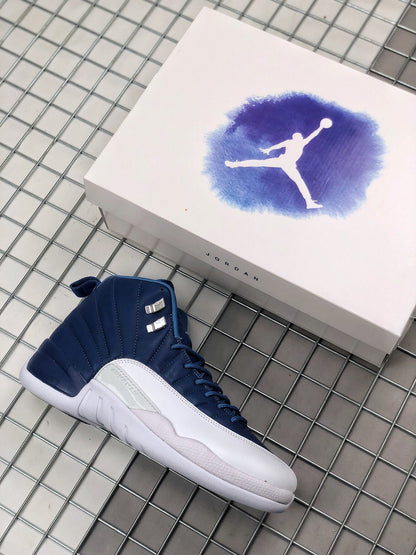 Indigo and white Jordan sneaker pictured beside a Jordan-branded shoebox.