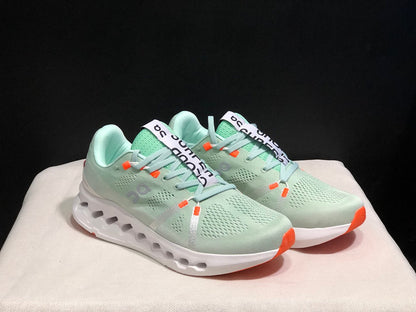 On Cloudsurfer Sneakers in Pale Green and White