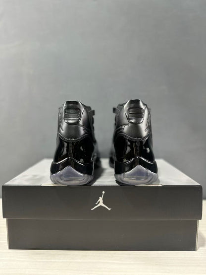 Rear view of the pair showing black heel panels, pull tabs, and translucent gray heel sections.