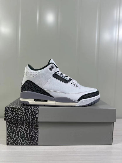 Side profile showing the white upper, black elephant-print overlays, grey midsole, and visible outsole window.