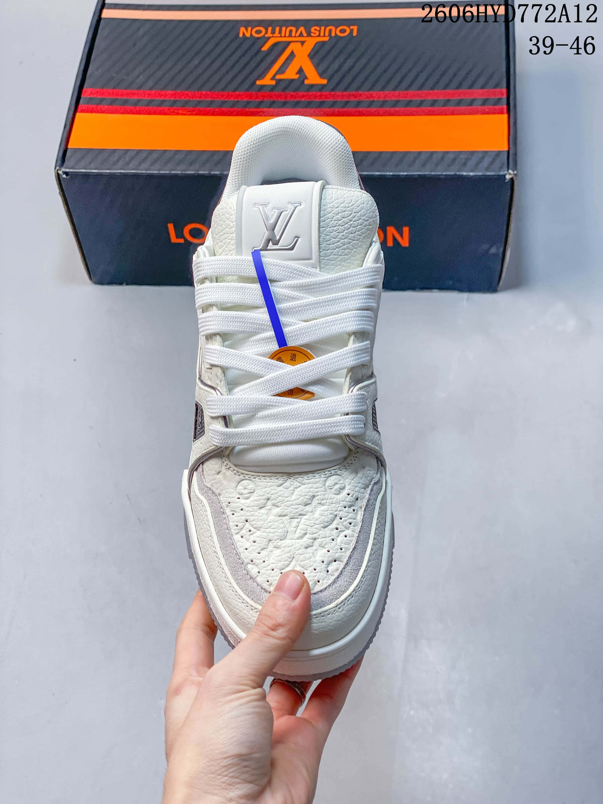Louis Vuitton White Low-Top Sneakers with Silver Accents