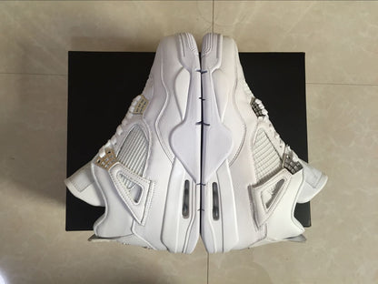Top-down view of the pair showing the white uppers, side mesh panels, lace wings, and sculpted midsoles.