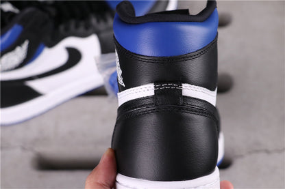 Rear close-up of a black, white and blue high-top sneaker.