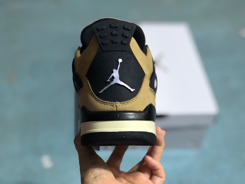 Rear view showing the black heel panel, Jumpman mark, and layered sole.