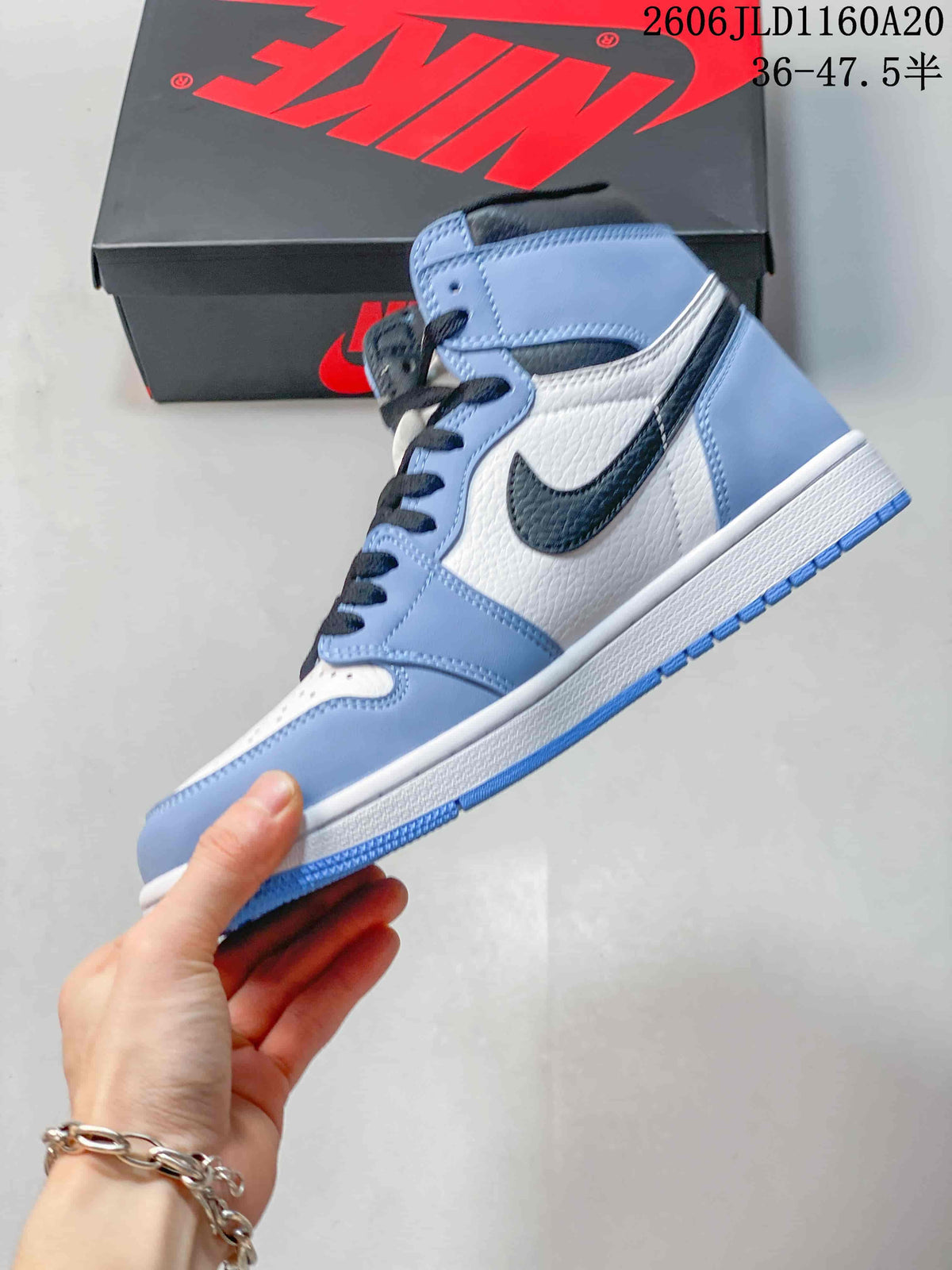 Jordan Air Jordan 1 High Sneakers in Blue and White