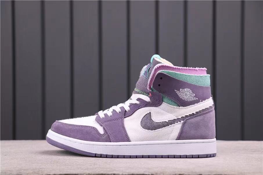 Opposite side profile showing the winged basketball emblem, Swoosh and lavender heel.