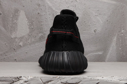Yeezy Boost 350 V2 Black Knit Sneakers with Red Accents