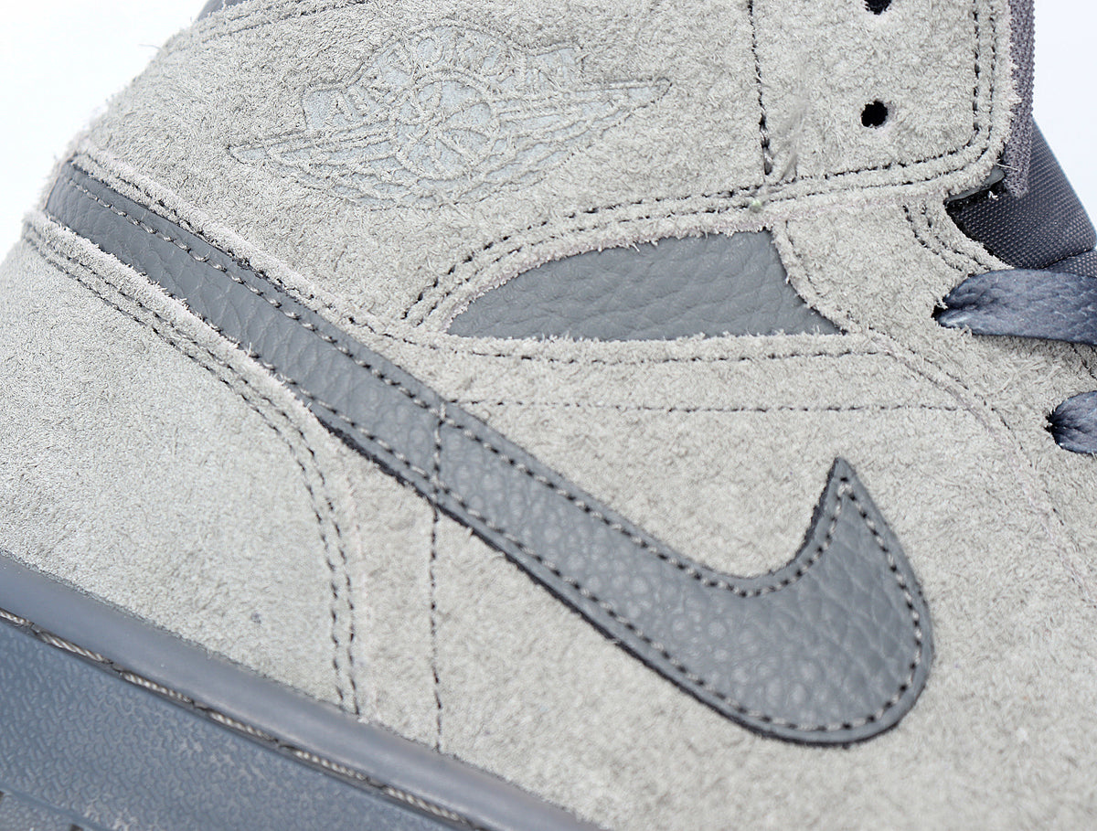 Close-up of the cool grey upper, dark grey Swoosh and stitched panel details.