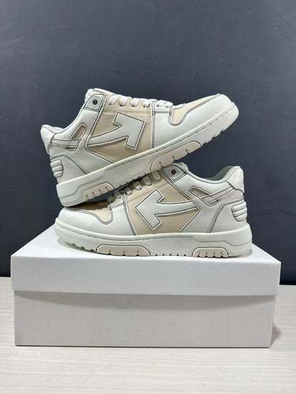 Two cream-white sneakers arranged one above the other to show the side design and outsole edge.