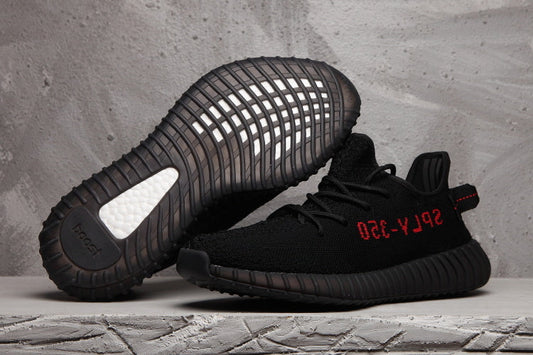 Yeezy Boost 350 V2 Black Knit Sneakers with Red Accents