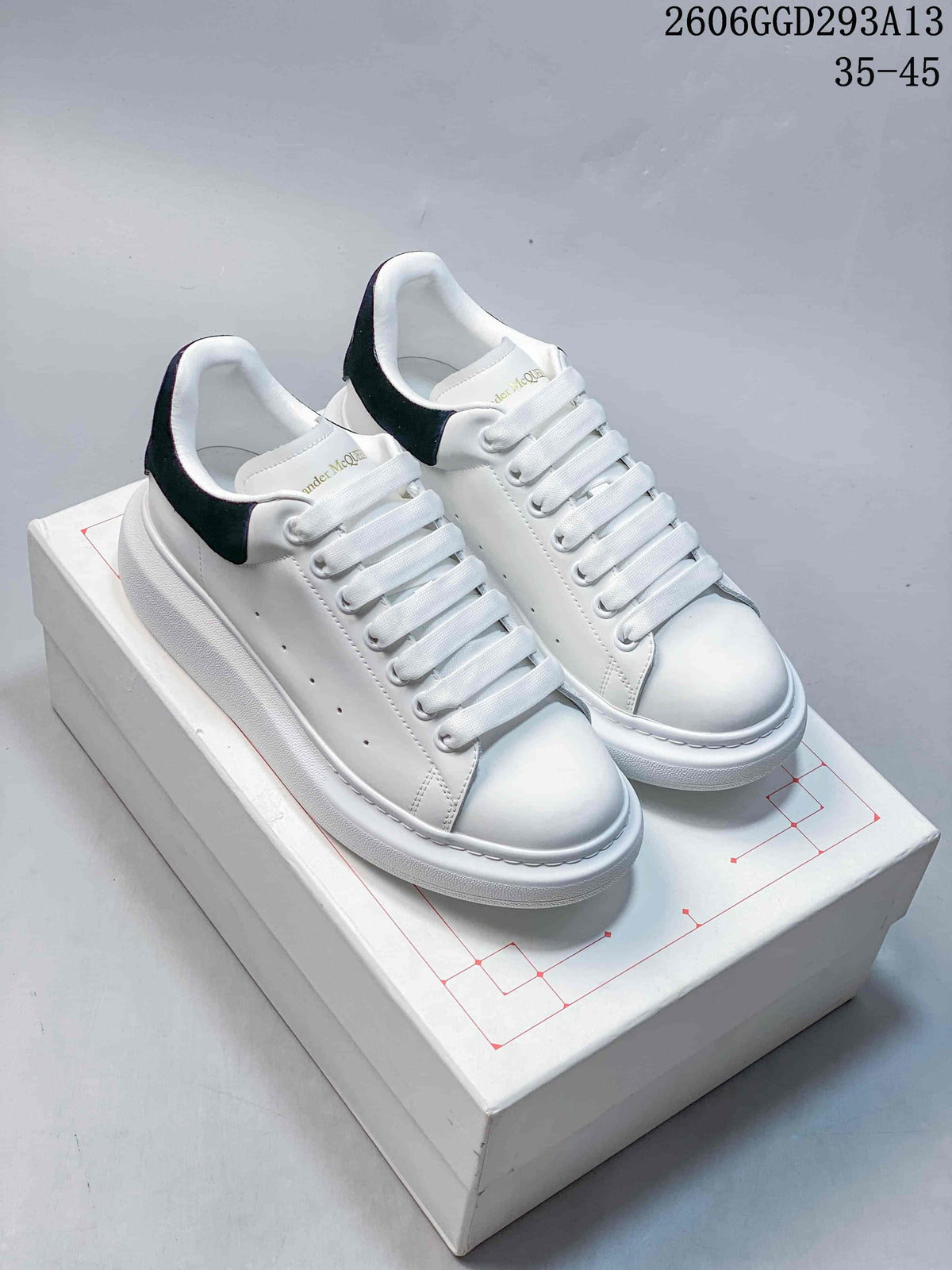 Alexander McQueen White Low-Top Sneakers with Black Heel Tab