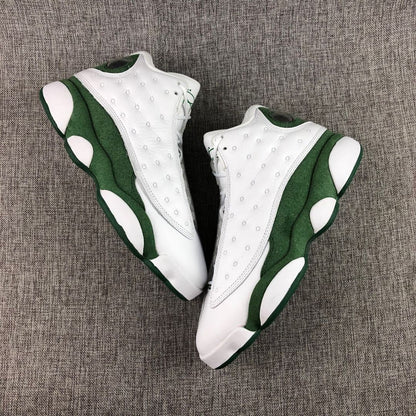 Top and side view of the white and green high-top sneakers with textured white panels and green midsoles.