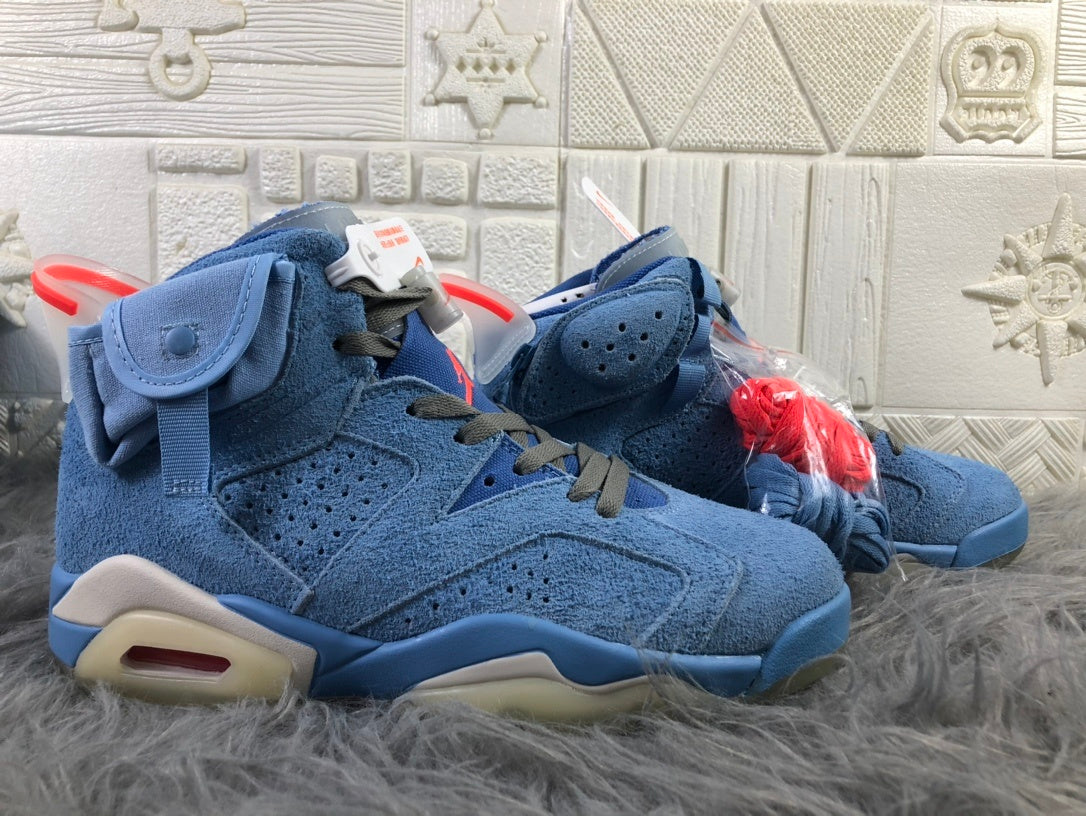 Side view of the sky blue high-top sneakers with perforated panels, ankle pocket details, and contrasting laces.