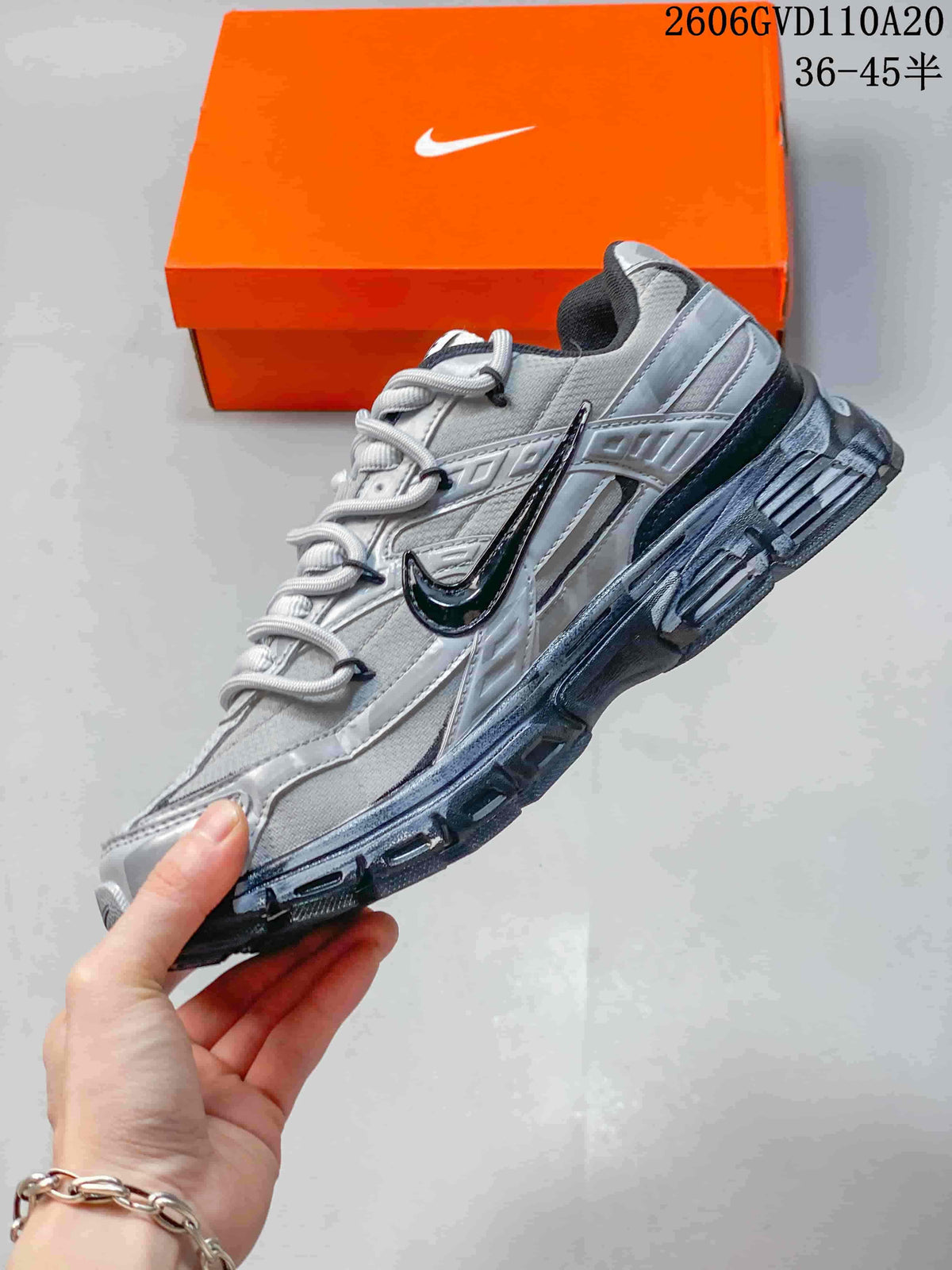 Nike Initiator Low-Top Sneakers in Silver and Black