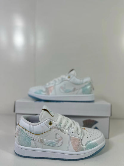 Close side view showing the layered upper, lace area, and pastel decorative panels.