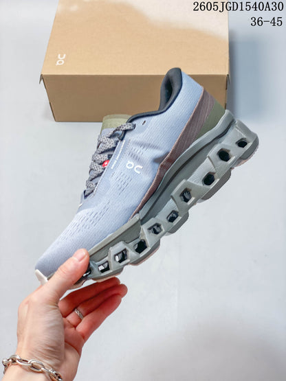 On Cloudmonster Void Low-Top Sneakers in Gray