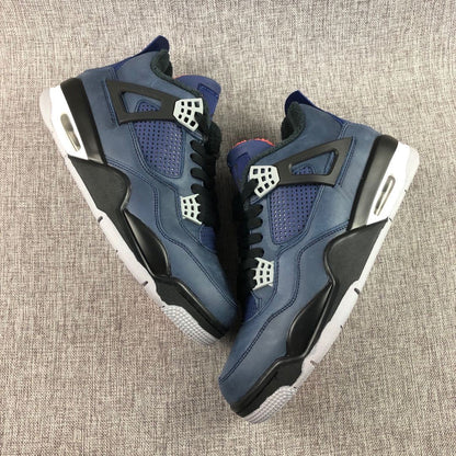 Two dark navy high-top sneakers displayed from above, showing black overlays, mesh panels, and white lace hardware.