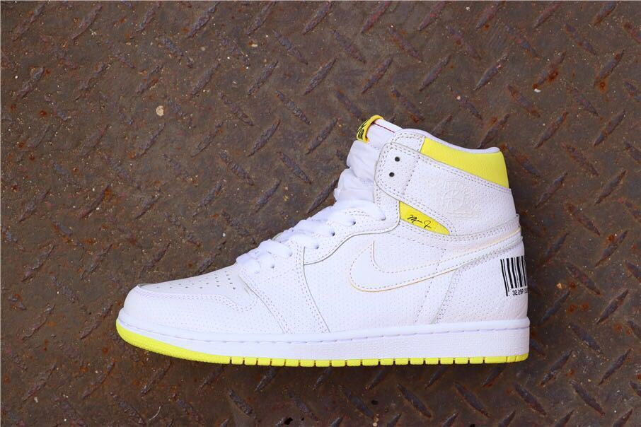 Inner side profile showing the white perforated upper and yellow outsole.