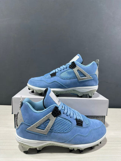 Three-quarter side view showing the blue uppers, mesh panels, molded side wings, and studded soles.