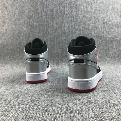 Rear view of the pair showing metallic silver heel panels, black collars, white midsoles and red outsoles.