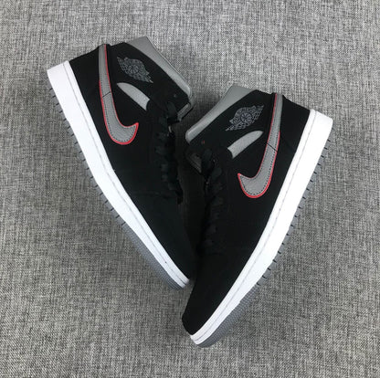 Top-down view of the pair showing black laces, grey collars and contrasting Swoosh details.