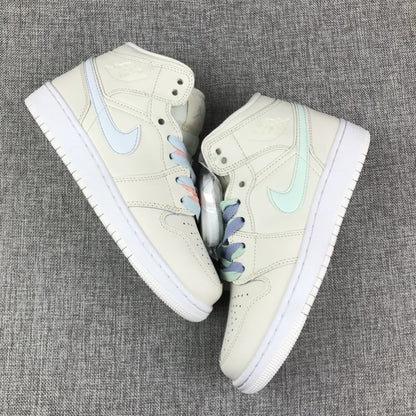 Top-down view of the pair displaying mismatched pastel Swoosh colors and multicolor laces.