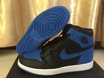 Side profile of a black and royal blue high-top sneaker with the blue outsole lifted to show its circular tread pattern.