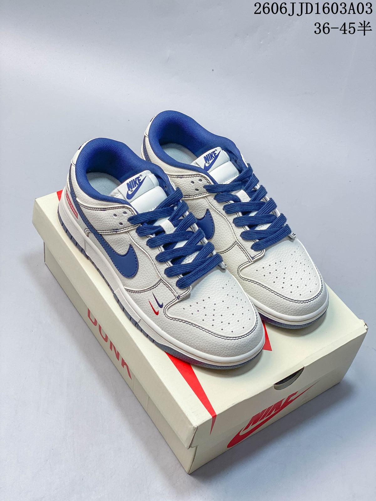 Nike SB Dunk Low White and Blue Low-Top Sneakers