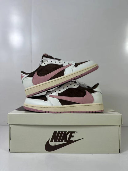 Two sneakers arranged together to show their side profiles and pink outsole edges.