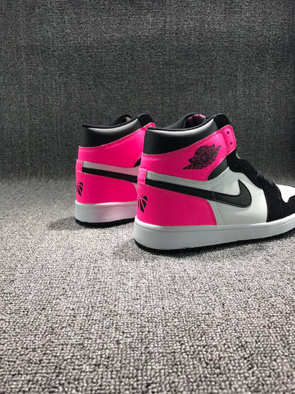 Rear three-quarter view highlighting the pink heel panels, black collars, white midsoles, and contrasting side details.