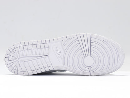 Underside view showing the white textured rubber outsole with circular and block tread patterns.
