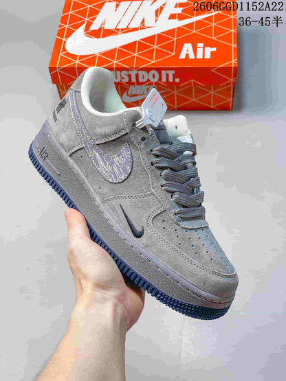 Nike Air Force 1 Low Sneakers in White, Gray, and Blue