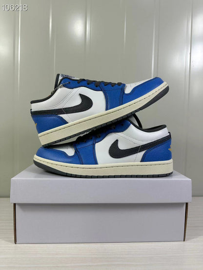 Two blue, white, and black low-top sneakers displayed at an angle.