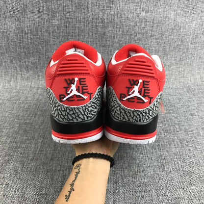 Rear view of the pair with red heel panels and elephant-print overlays.
