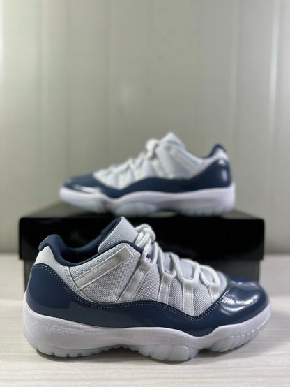 Close side view highlighting the white upper and glossy blue overlays