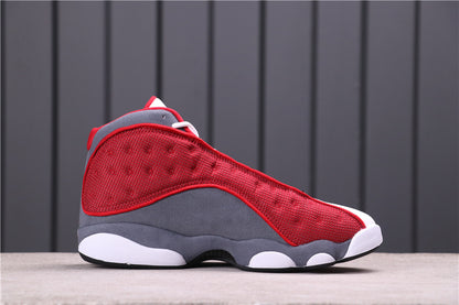 Opposite side view of a red and gray Air Jordan 13 sneaker.