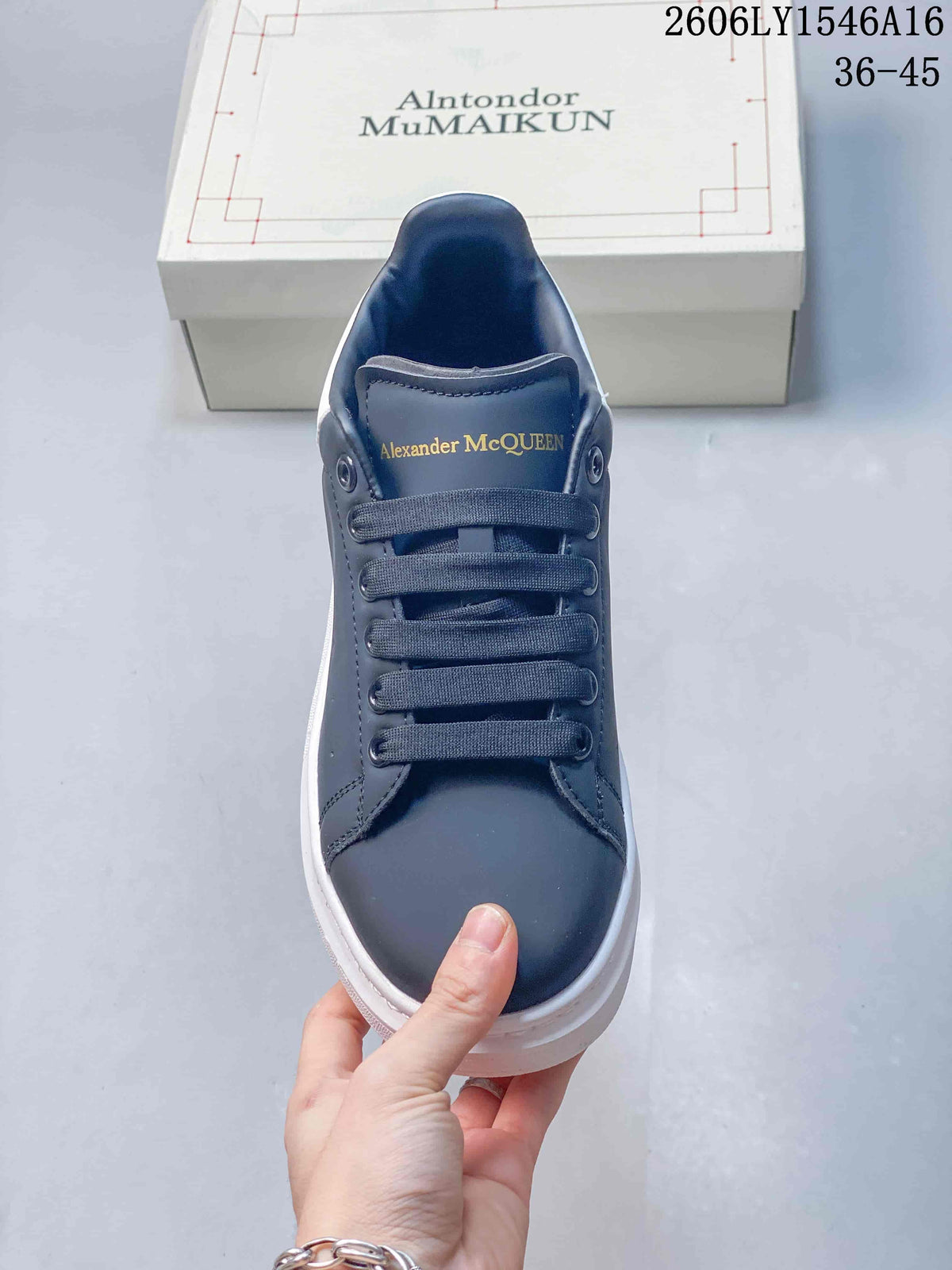 Alexander McQueen Low-Top Sneakers in Navy and White