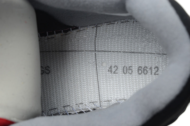 Interior size marking showing 42 and additional production markings.