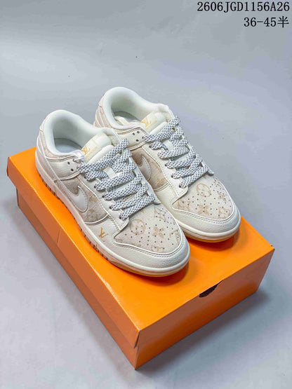Nike Dunk Low White and Blue Monogram Sneakers