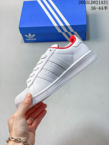 Adidas Superstar White Low-Top Sneakers with Red Accents